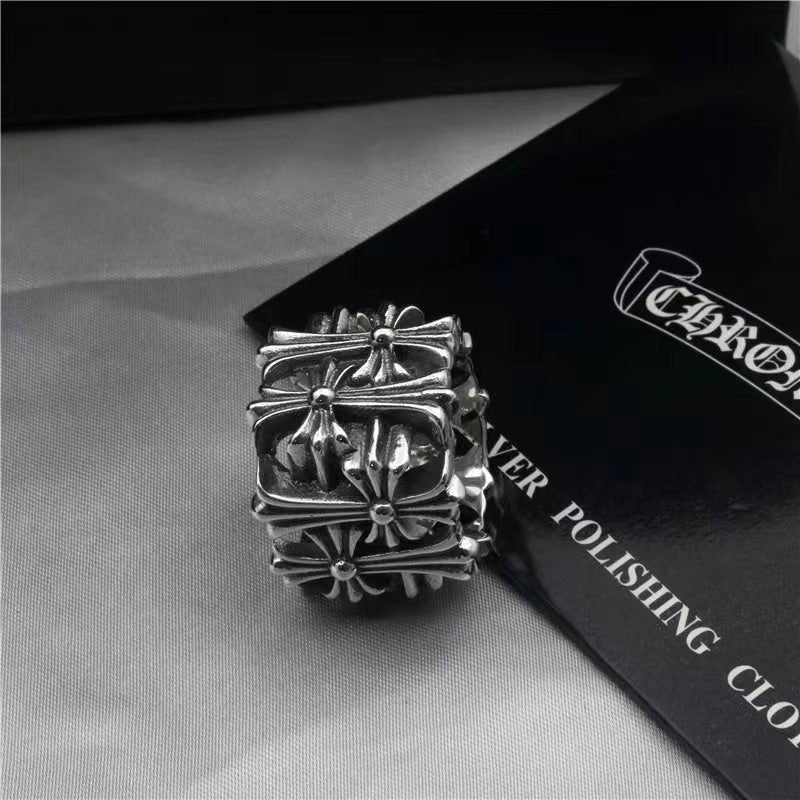 Chrome square ring with ornate crosswork