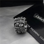 Chrome square ring with ornate crosswork