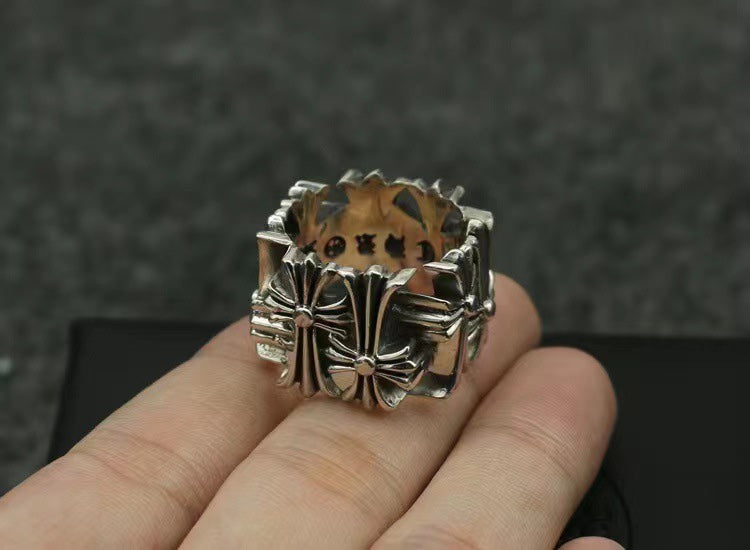 Chrome square ring with raised floral cross and starburst borders