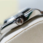 Rolex watch side profile with crown detail on stainless steel case