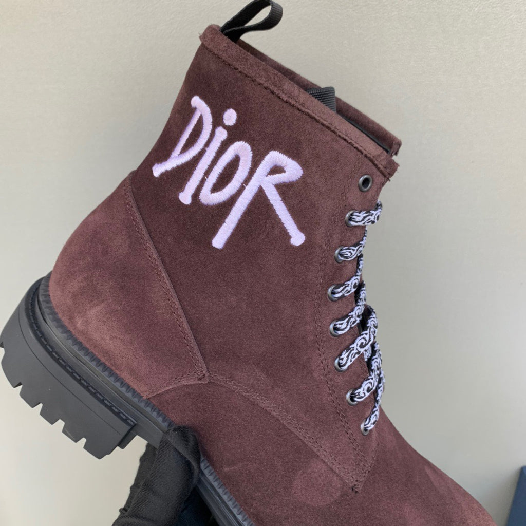 Dior unisex lace-up boots in dark brown suede with white laces and Dior branding