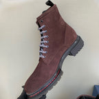 Unisex lace-up boots in dark brown suede with white laces and thick treaded sole
