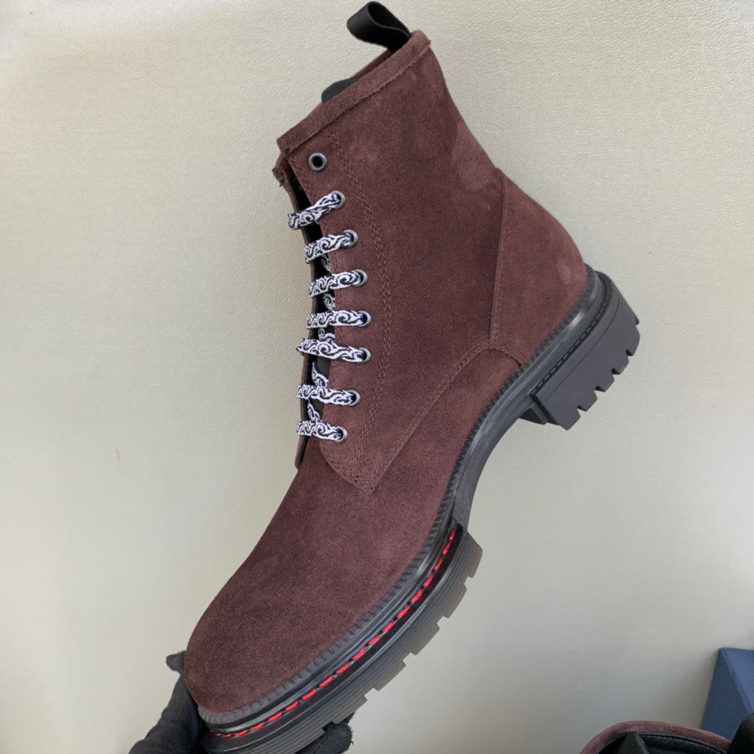 Unisex lace-up boots in dark brown suede with white laces and thick treaded sole