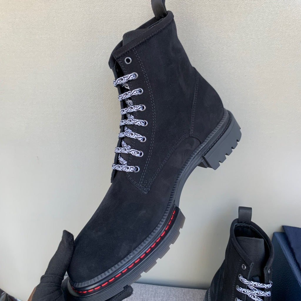 Black suede lace-up ankle boots with heel pull tab and red sole edge trim