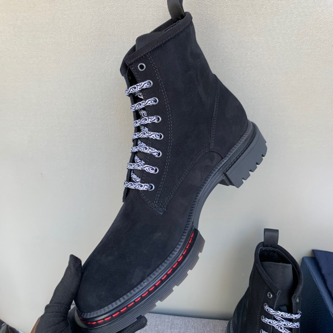 Black suede lace-up ankle boots with heel pull tab and red sole edge trim
