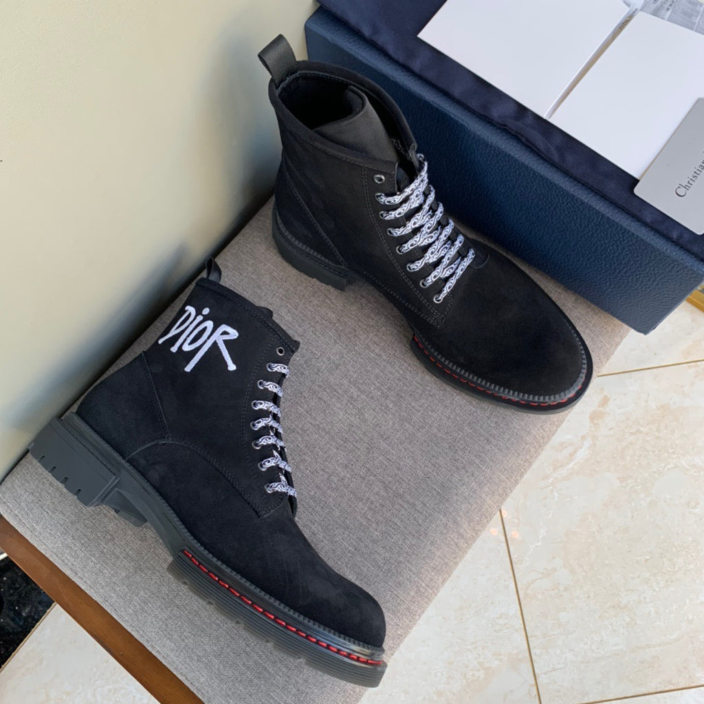 Black suede Dior lace-up ankle boots, chunky sole and red edge stitching