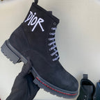 Black suede high-top ankle boots with Dior logo and lace-up front, chunky sole