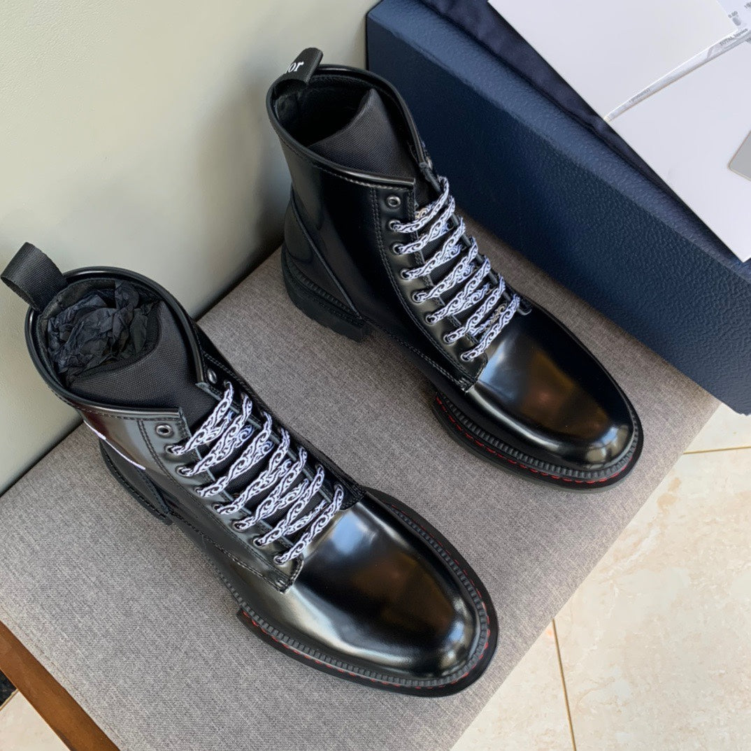 Black unisex leather ankle boots with lace-up closure and Dior logo on the tongue