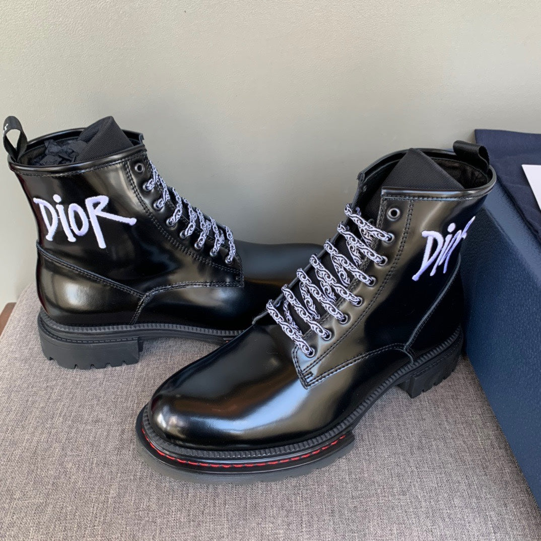 Black unisex leather lace-up ankle boots with Dior logo and chunky rubber soles