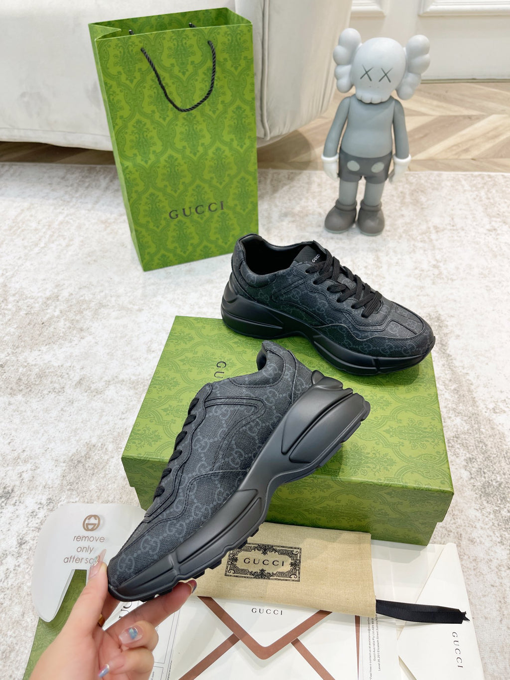 Gucci unisex sneakers, dark gray, front pair on box with lace-up details