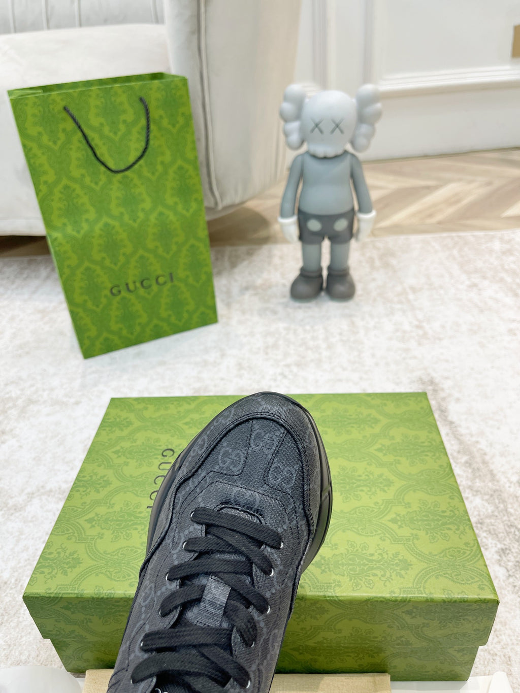 Gucci unisex dark gray sneaker with lace-up closure and rounded toe