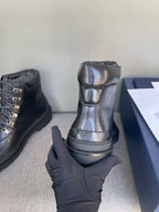 Dior dark leather lace-up boot with logo panel and cushioned collar, thick sole