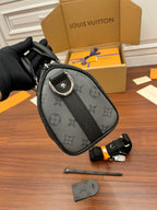 Men's Louis Vuitton monogram mini bag with top handle, dark gray, round detail