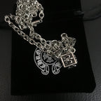 Silver-tone chain necklace with square and circular charm pendants