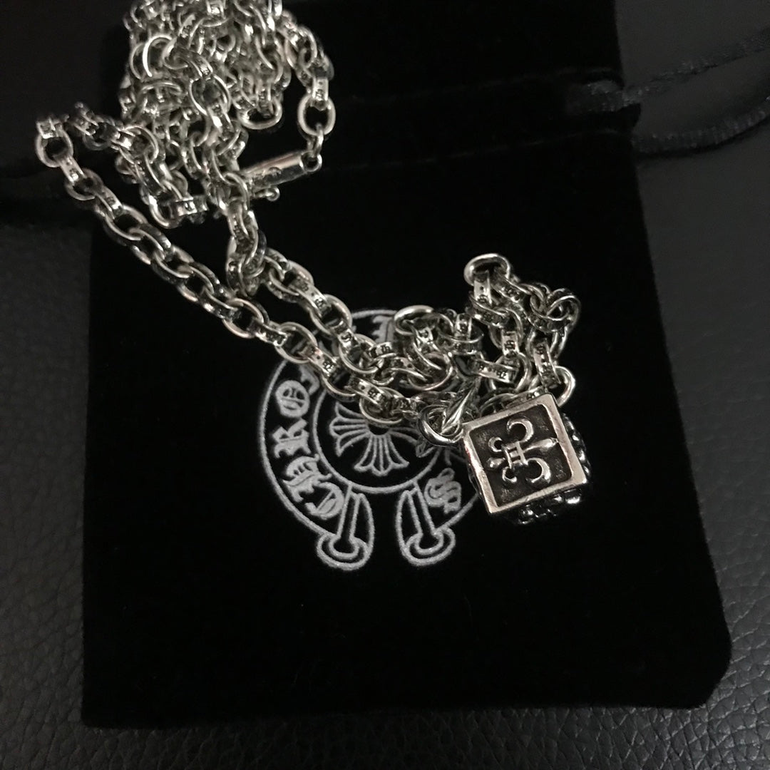 Silver-tone chain necklace with square and circular charm pendants