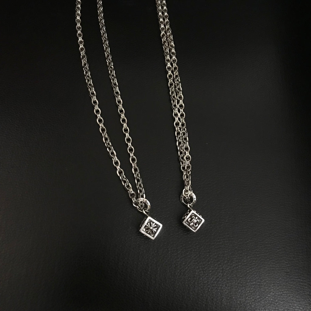 Silver-tone chain necklace with small square charm pendants