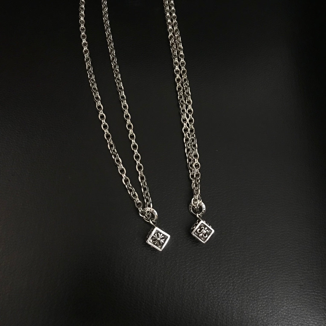 Silver-tone chain necklace with small square charm pendants