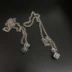 Silver-tone charm necklace with two dangling square pendant charms