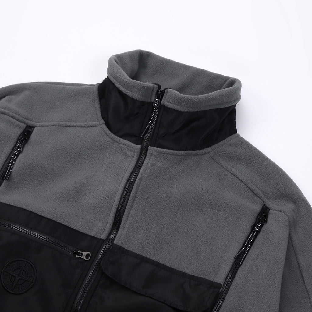 Stone Island fleece jacket close-up, stand collar with black zipper front