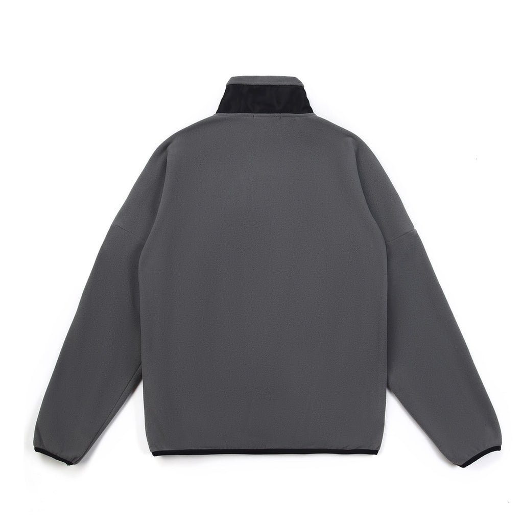 Stone Island jacket back view, gray with black inner yoke and high collar