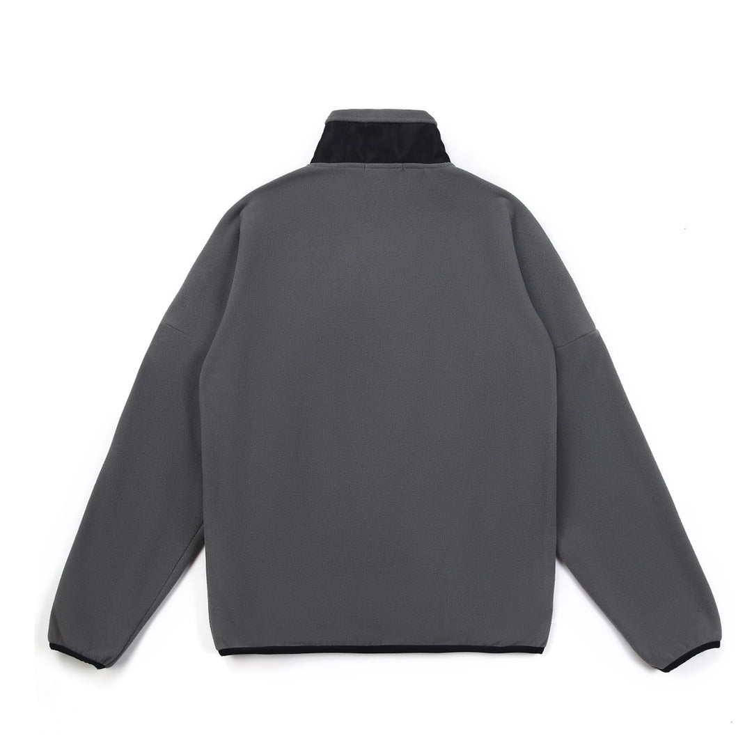 Stone Island jacket back view, gray with black inner yoke and high collar