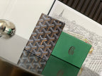 Goyard small bag with textured brown-and-beige geometric coated canvas exterior and front flap