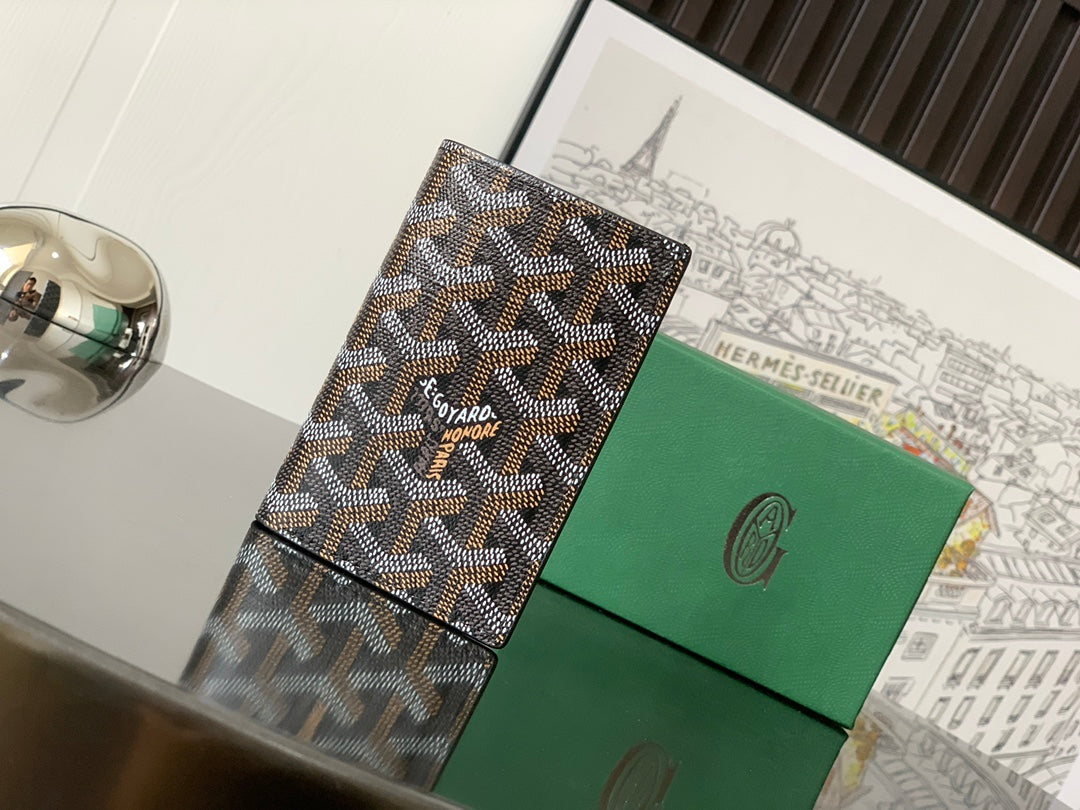 Goyard small bag with textured brown-and-beige geometric coated canvas exterior and front flap