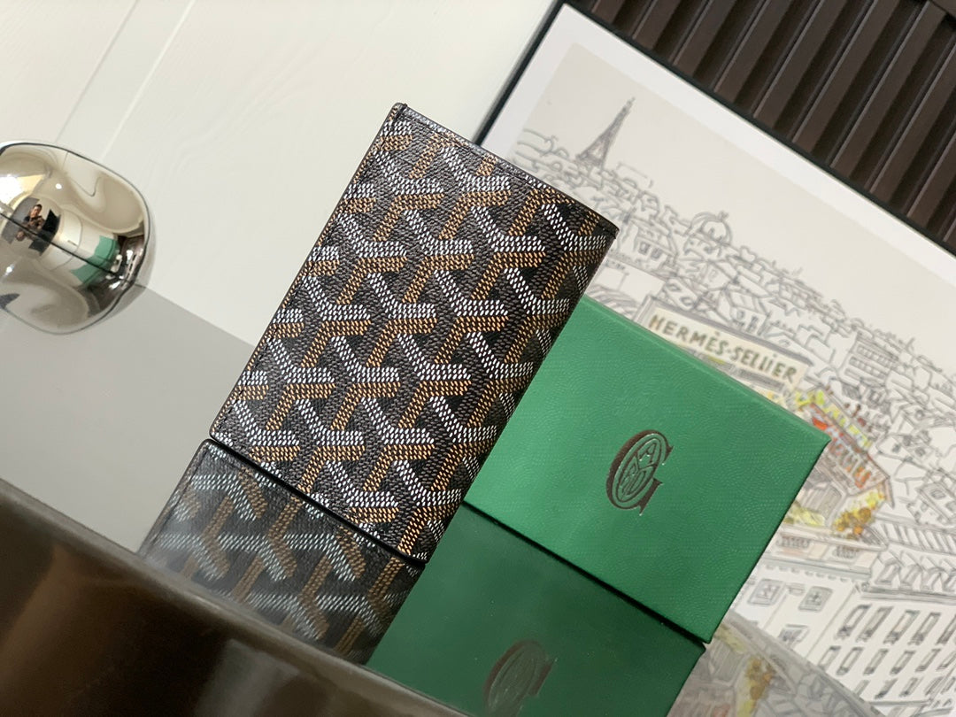 Goyard small bag with brown-and-beige geometric coated canvas, black edges, and top flap