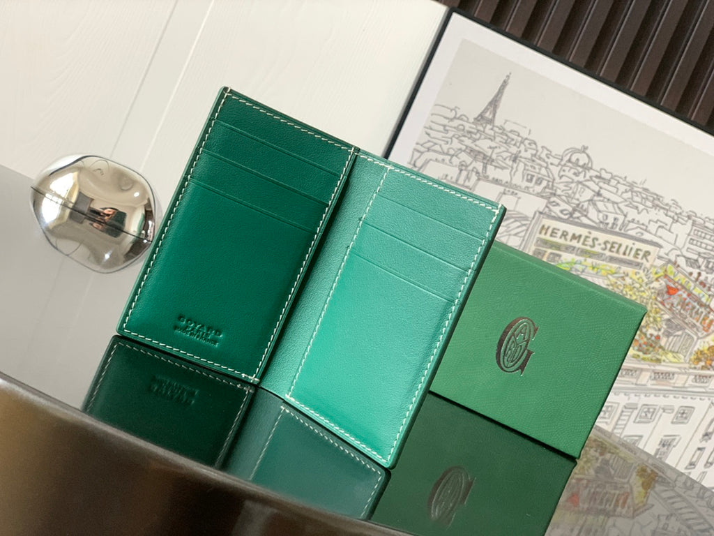Green leather bag wallet with card slots and stitched interior panels