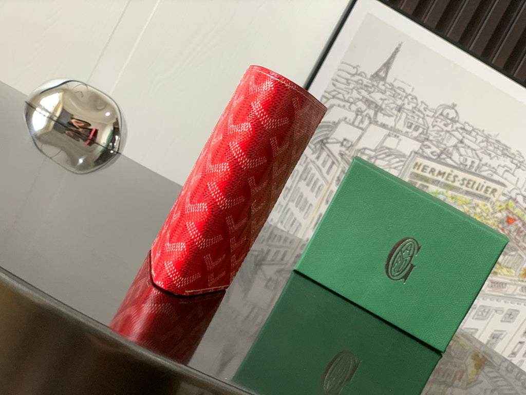 Goyard small wallets, side view: red patterned card case with green leather case