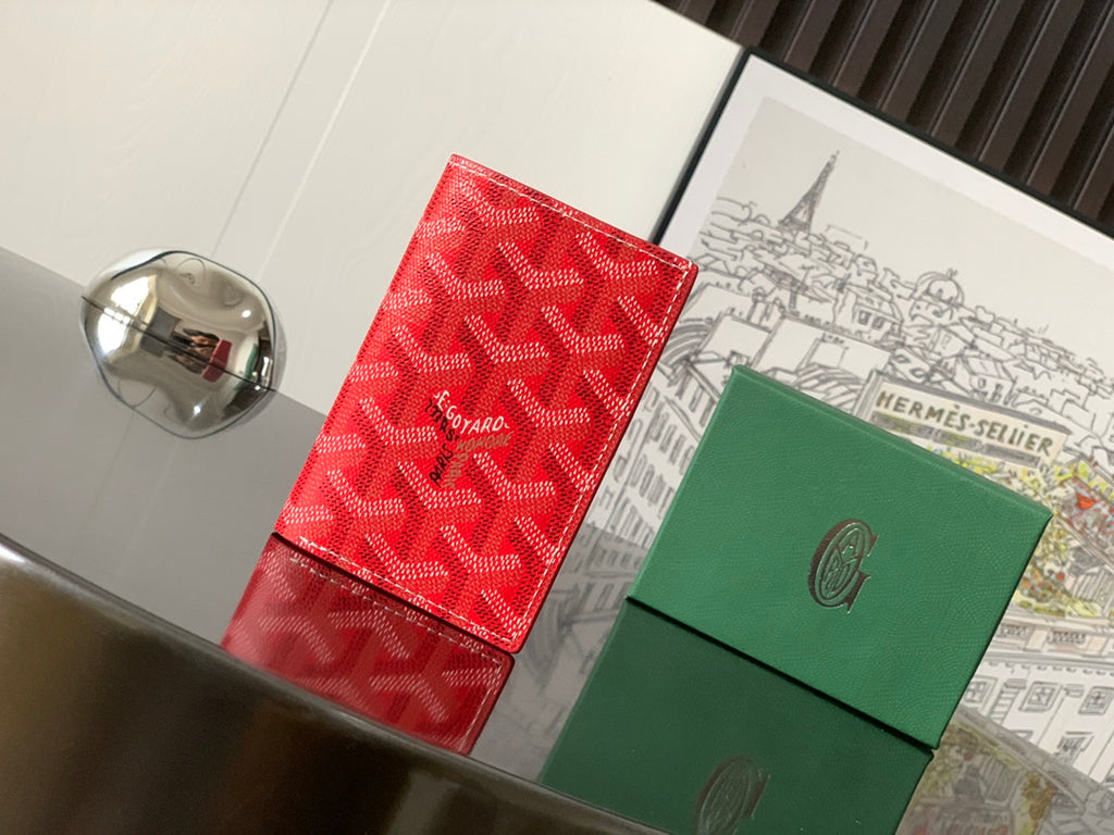 Goyard small wallets, front view: red patterned card case with green leather case