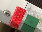 Goyard small wallets, front view: red patterned card case with green leather case