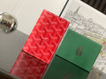 Goyard small wallets: red patterned card case and green leather card case