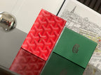 Goyard small wallets: red patterned card case and green leather card case