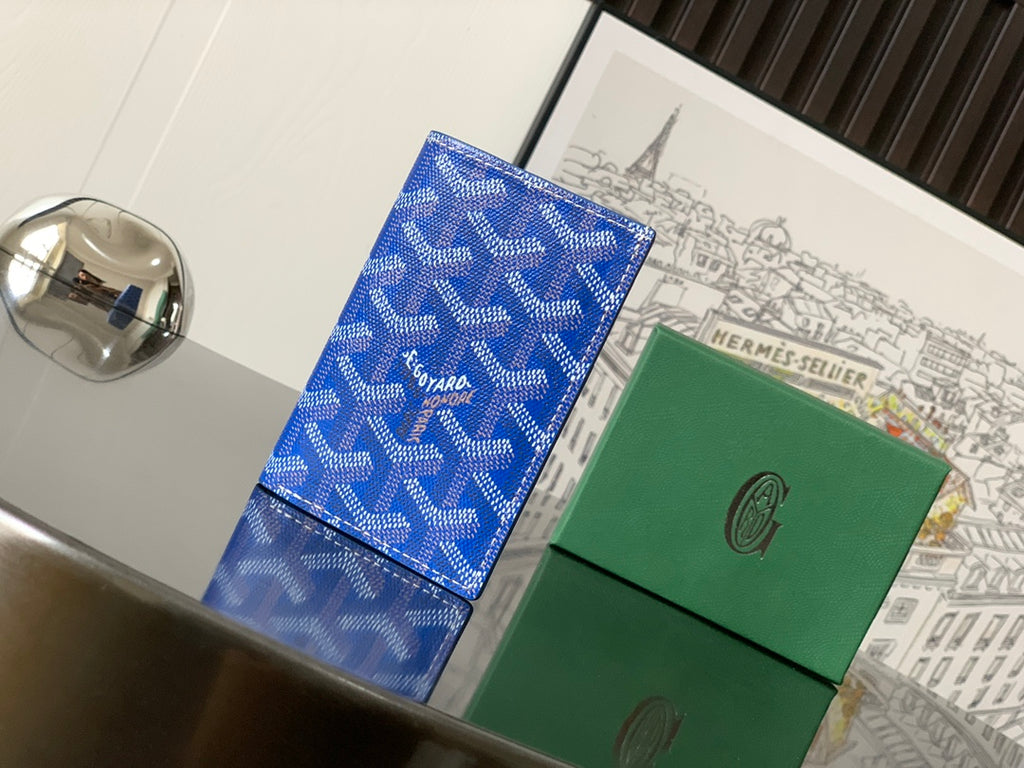 Goyard blue patterned leather wallet with flap and stitched edges