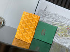 Yellow small bag with Goyard-style pattern, front flap and stitched edges