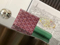 Goyard patterned card holder in burgundy with top-strap flap