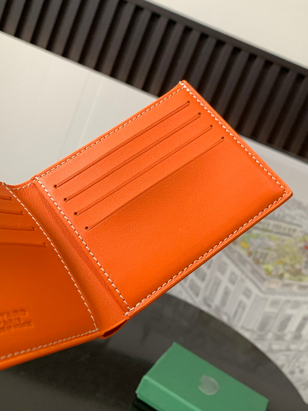 Goyard small orange leather card holder open with 4 slots