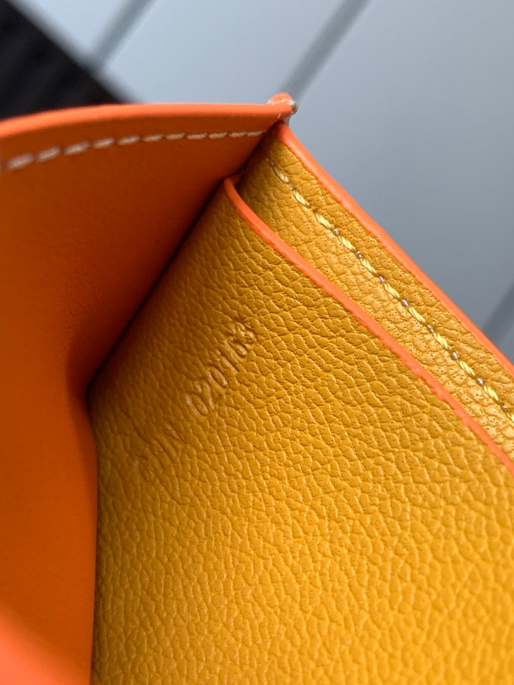 Goyard small leather wallet corner with yellow lining and pink trim