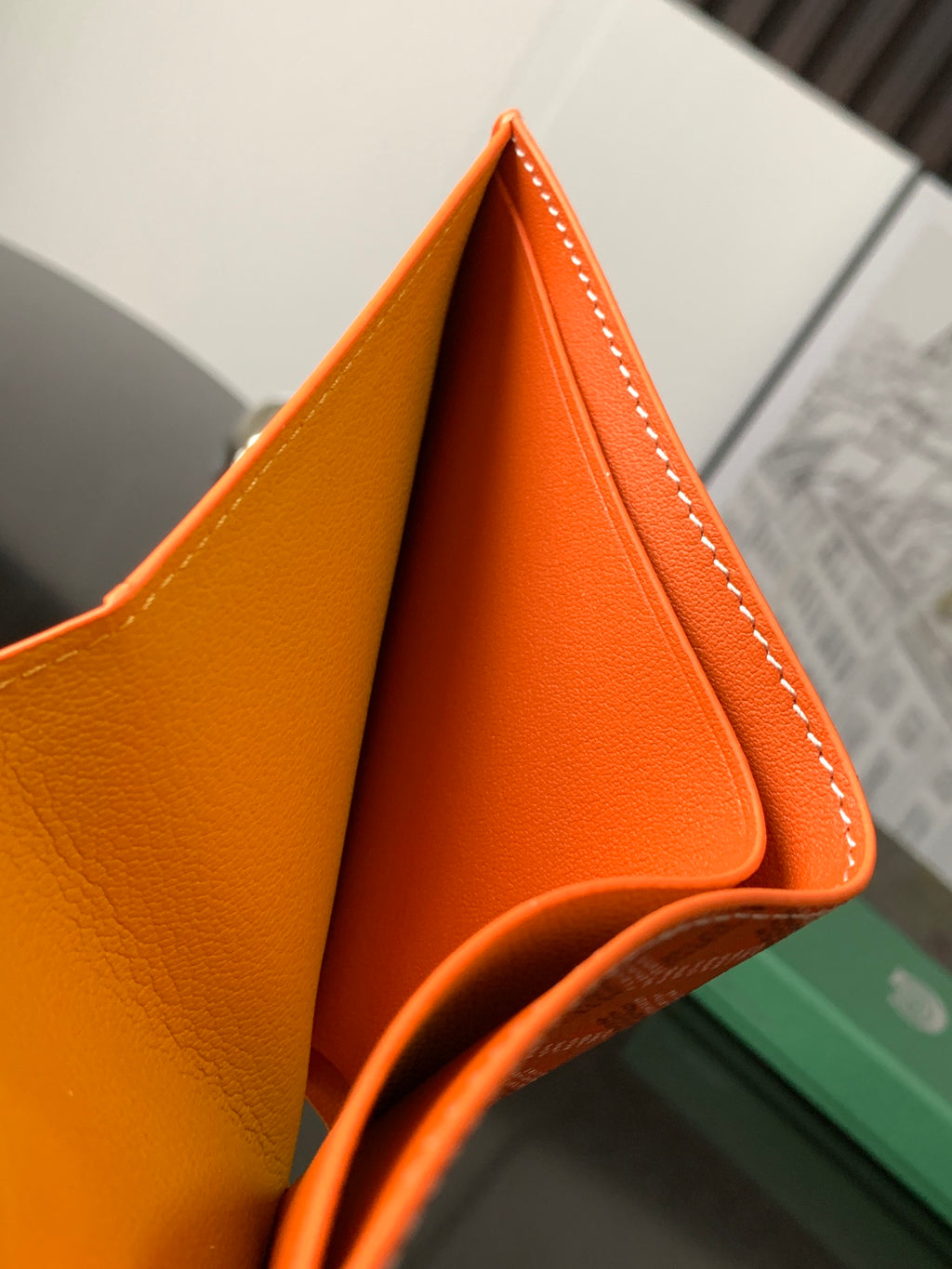 Goyard small orange leather wallet interior with curved pocket