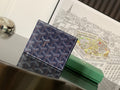 Goyard small bag with navy patterned exterior and dark leather trim
