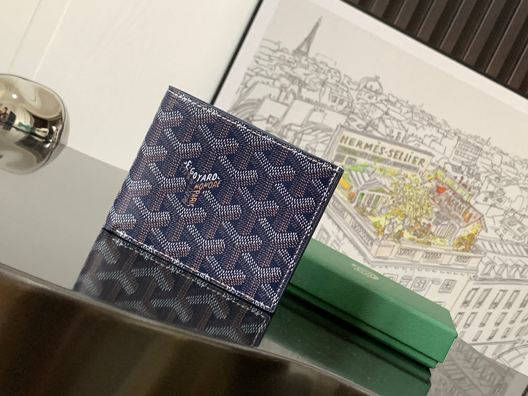 Goyard small bag with navy patterned exterior and dark leather trim