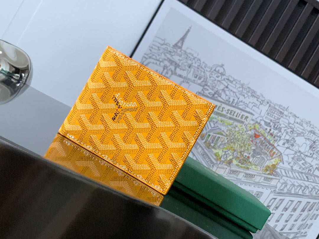 Goyard small bag, yellow patterned canvas with logo detail