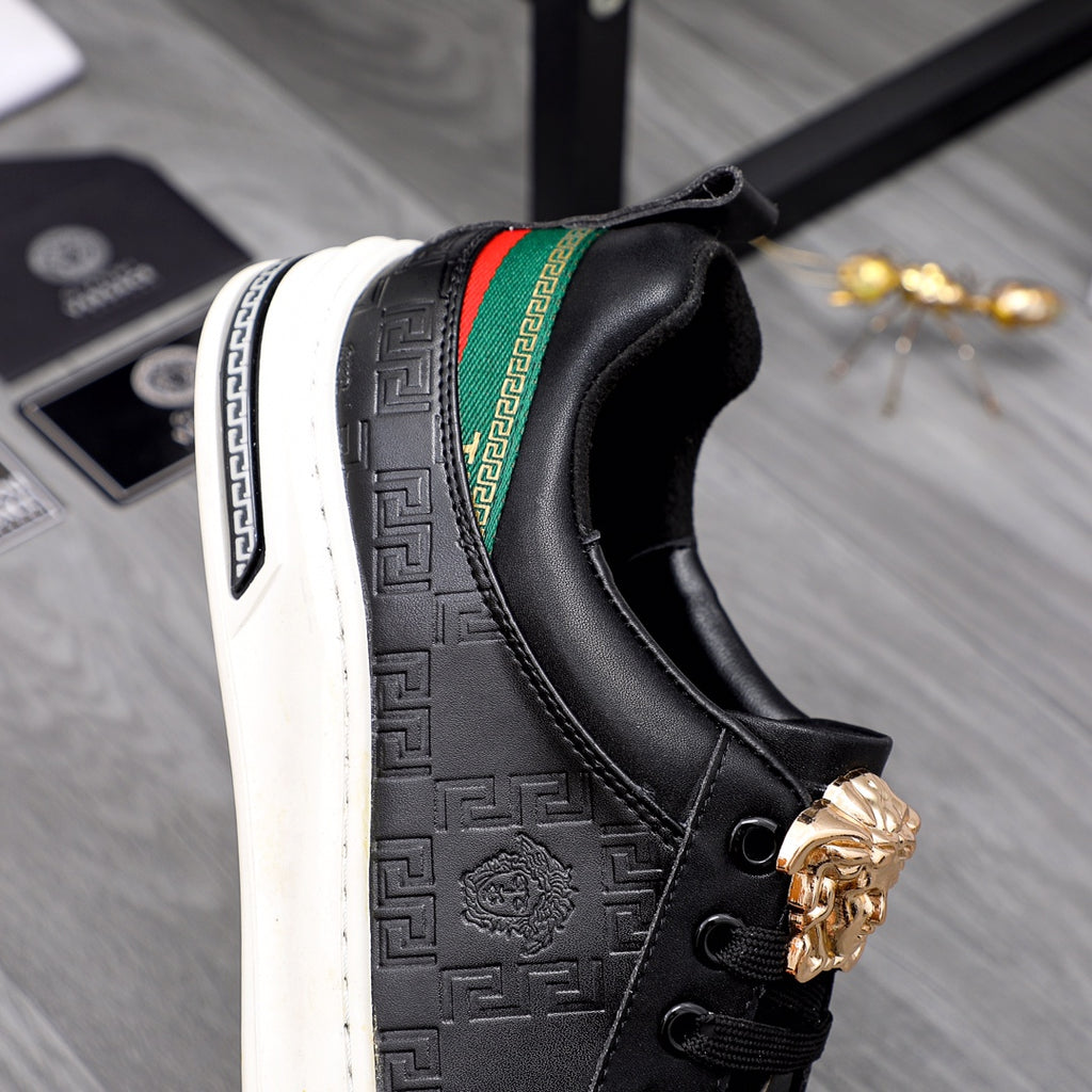 Versace black low-top sneaker side view, green/red stripe and gold crest emblem