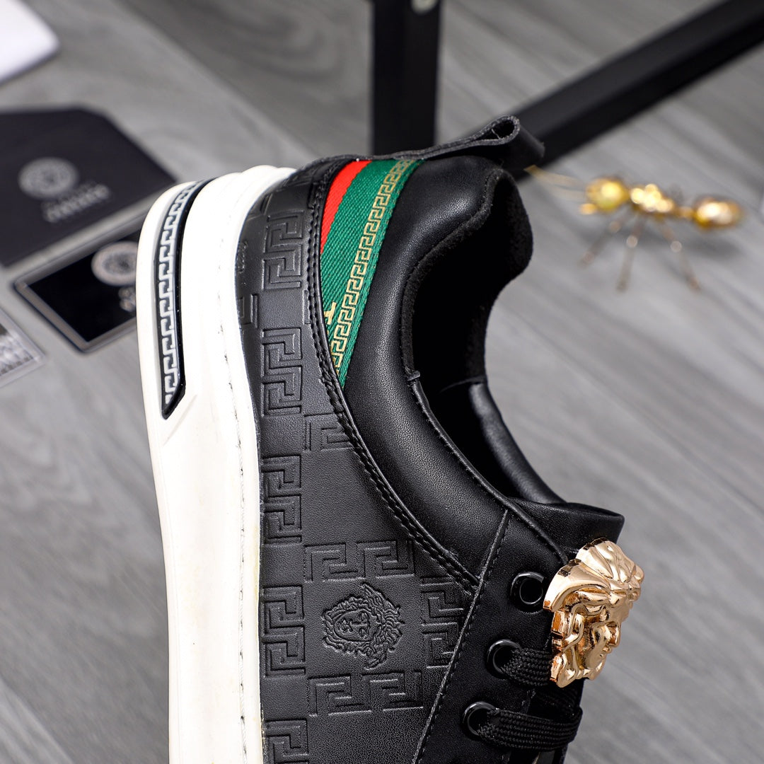 Versace black low-top sneaker side view, green/red stripe and gold crest emblem