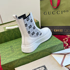 Gucci unisex ankle boots, white with black logo side panels and embossed rubber sole