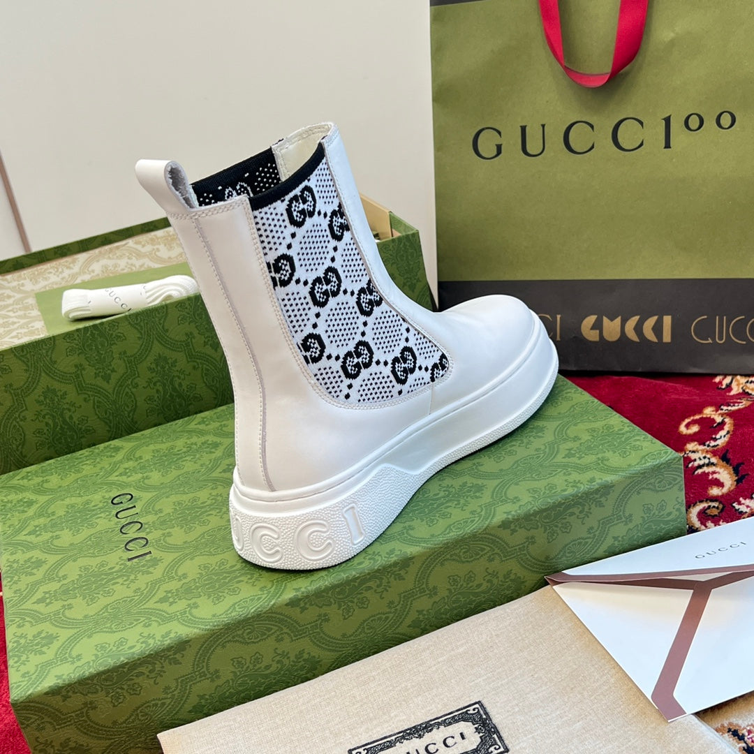 Gucci unisex ankle boots, white with black logo side panels and embossed rubber sole