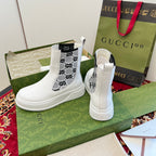 Gucci unisex ankle boots, white leather with black logo side panels and pull tabs