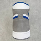 Back view of high-top sneaker with gray upper, blue trim, and white outsole