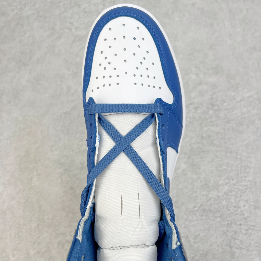 High-top sneaker with blue collar, white perforated toe, and blue crisscross laces